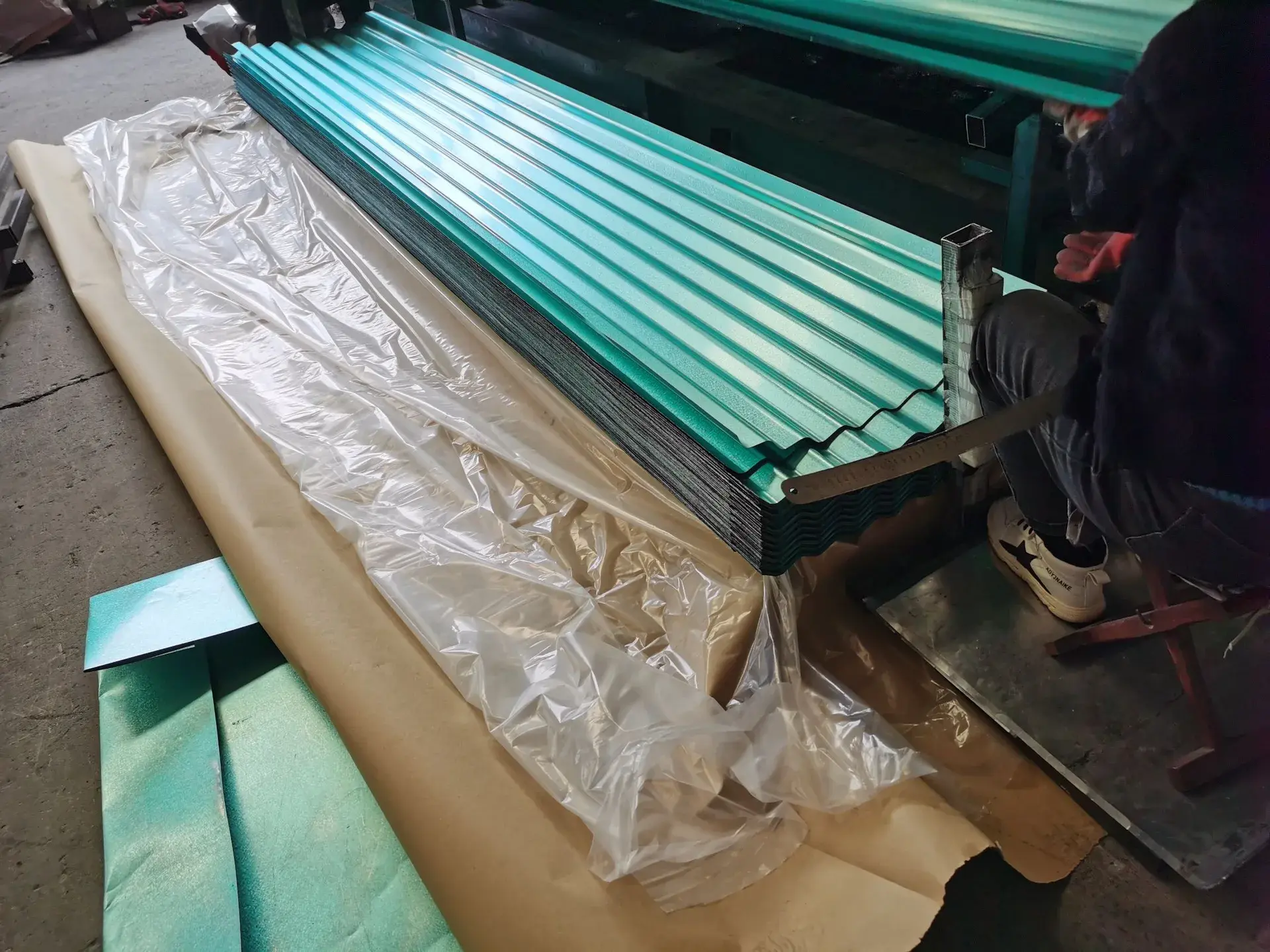 Installed steel roofing sheet profile with side laps